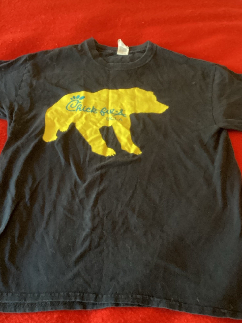 Gildan Black Tee with Yellow Bear UCLA Chick‑fil‑A Logo